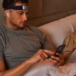 Man in bed using Muse